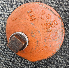 SHURJOINT 7160P: 4″ x 1″ End Cap With Plug, Orange, NPT, Painted Ductile Iron