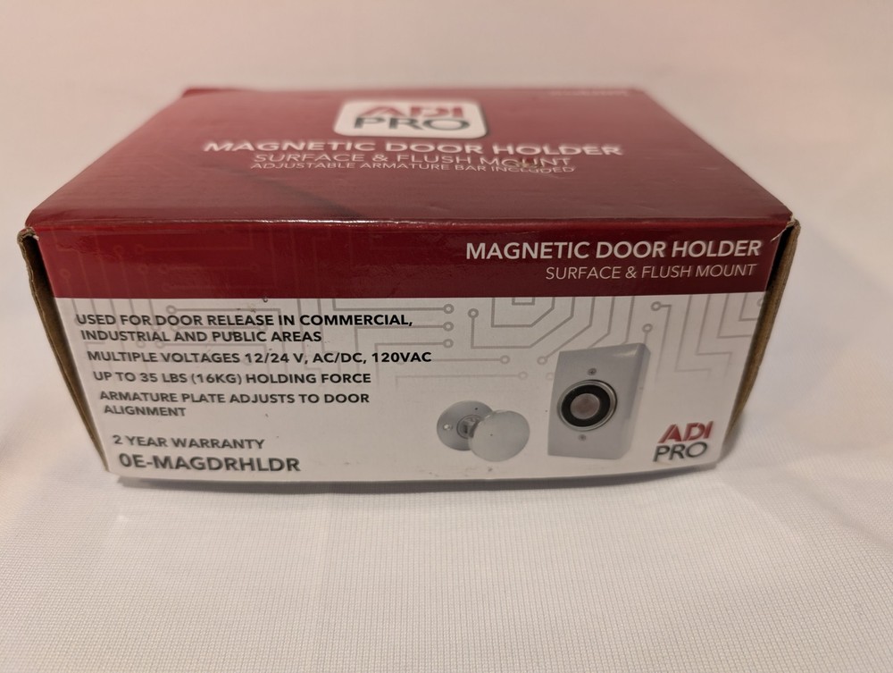 New ADI PRO 0E-MAGDRHLDR Magnetic Door Holder, Surface and Flush Mount