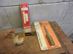 DOOR OPENER ( it unlocks the latch ) and a Door Hinge Pin closer