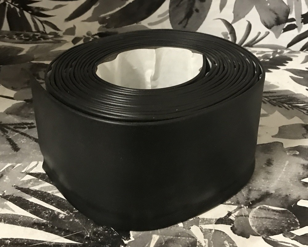 ➿ Roppe 4 In. x 20 Ft. Roll Vinyl Self-Stick Wall Cove Base HC40C53S184