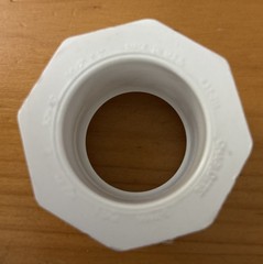Charlotte Pipe 1-1/2 In. SPG x 1 In. Slip Schedule 40 PVC Bushing Charlotte Pipe