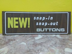 Vintage Snap In Buttons Store Sign “New! Snap-in Snap-Out Buttons” Plastic Sign