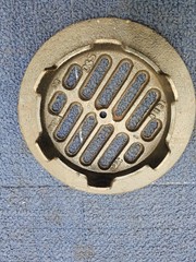 NYLOPLAST 8″ Drop-In Grate. Ductile Iron, Round, Black Fits 8″ Pipe